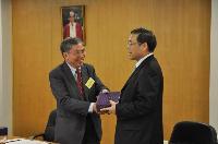 Prof. Chan Wai-Yee, SBS Director presented souvenir to Mr. Liu Qian, Vice-Minister of Health